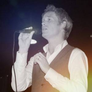 The Suited Singer